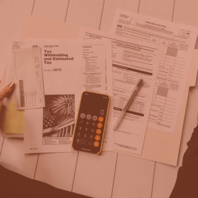 Tax Forms Spread Out with pencil and calculator